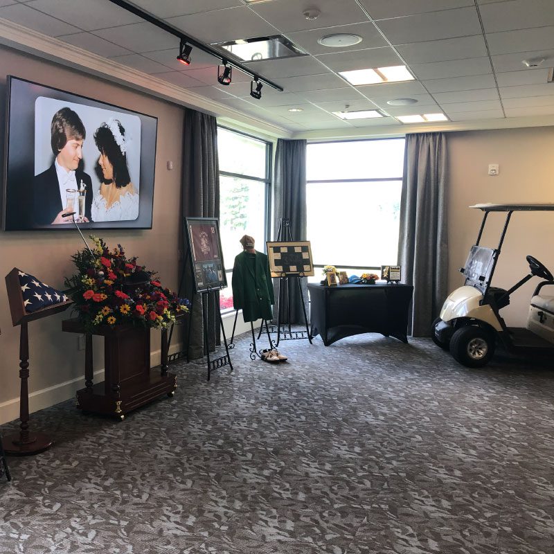 Custom Funeral Services of a golf themed funeral with golf clubs and a golf cart