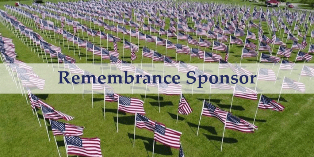 Image of flags in the grass on white flag poles with text on a banner over the image that says Remembrance Sponsor
