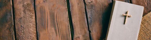 Bible on Wood Background